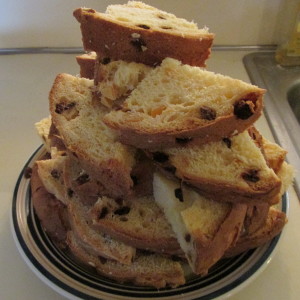 Panettone quartered slices ready to be batter dipped.